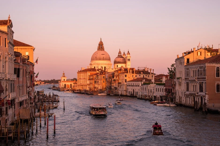 A montage of diverse cultural landmarks and vibrant street festivals from around the world.